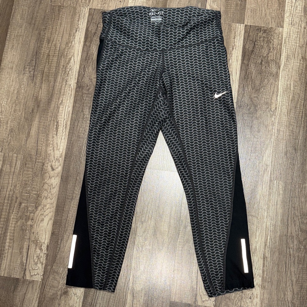 Nike Dri-fit Running Capri tights - Women size: XS. Used a bit. Selling as is.
